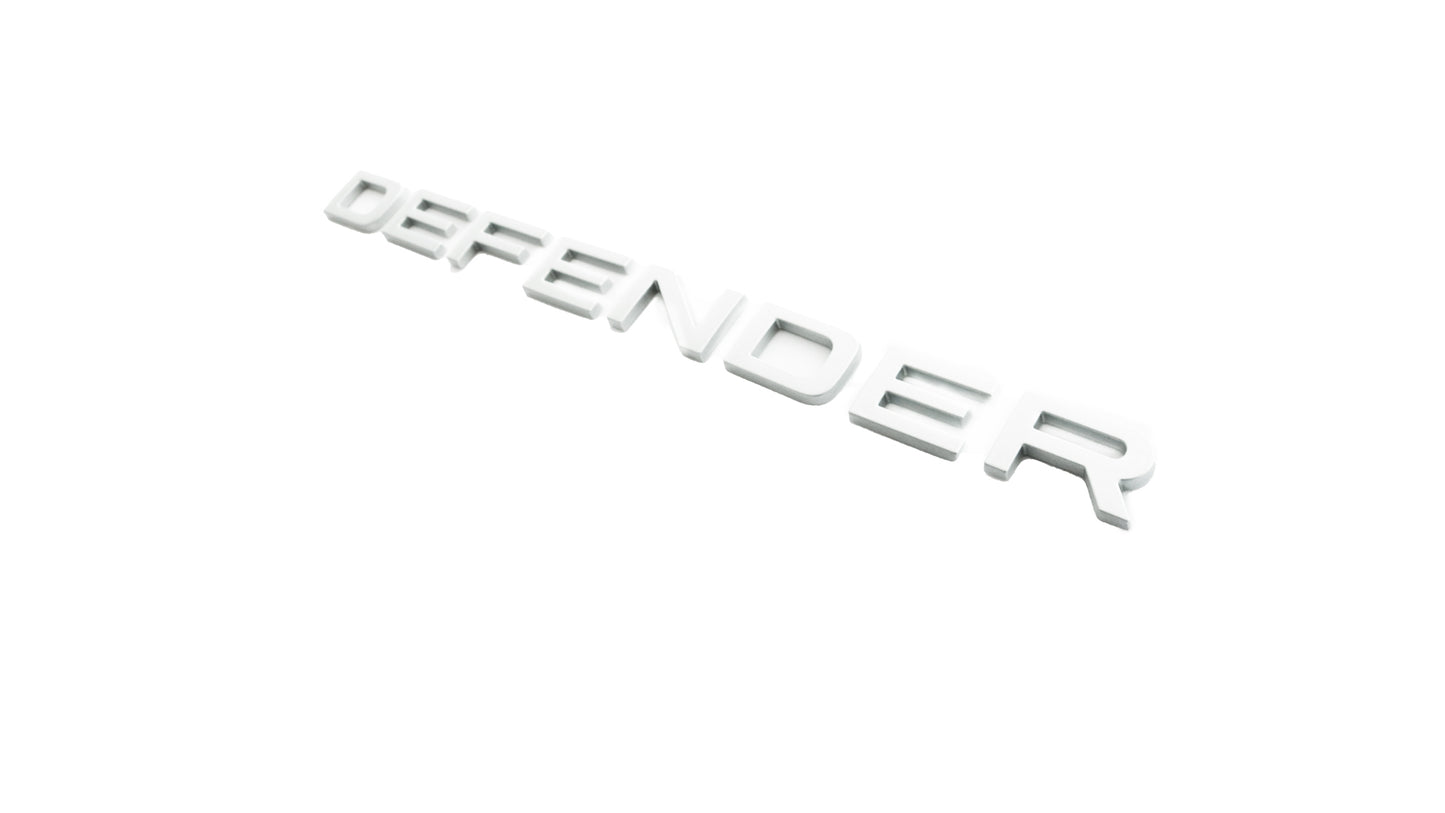 Aftermarket Trunk Name Plate - LR130854TB Silver (Defender)