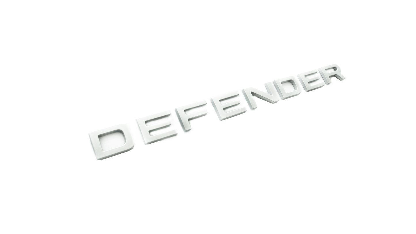 Aftermarket Trunk Name Plate - LR130854TB Silver (Defender)