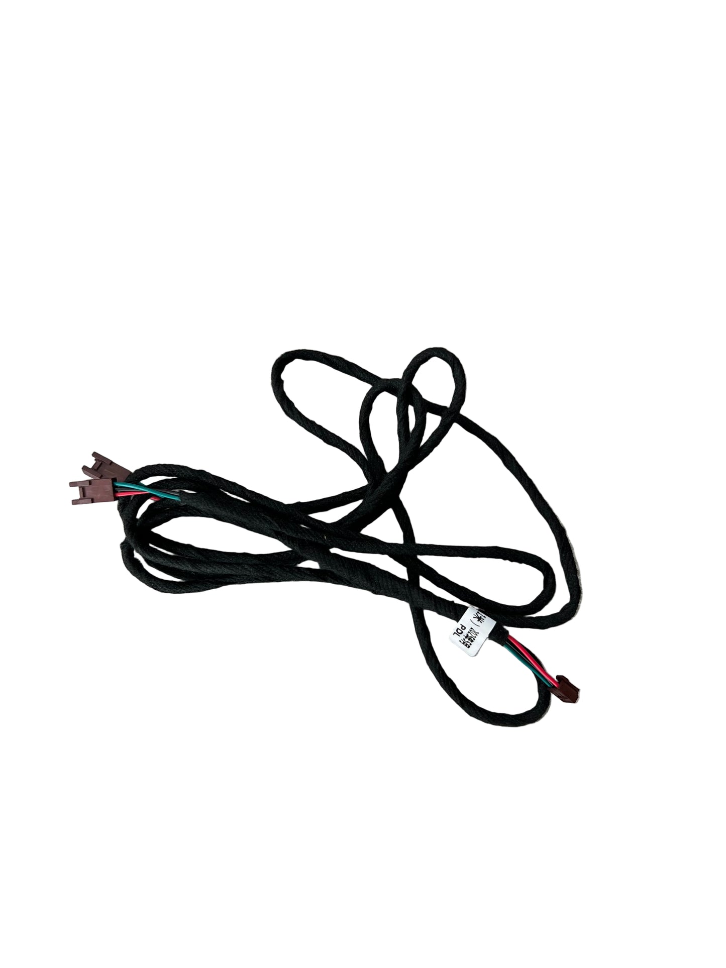 Black electrical wire harness on a wooden floor