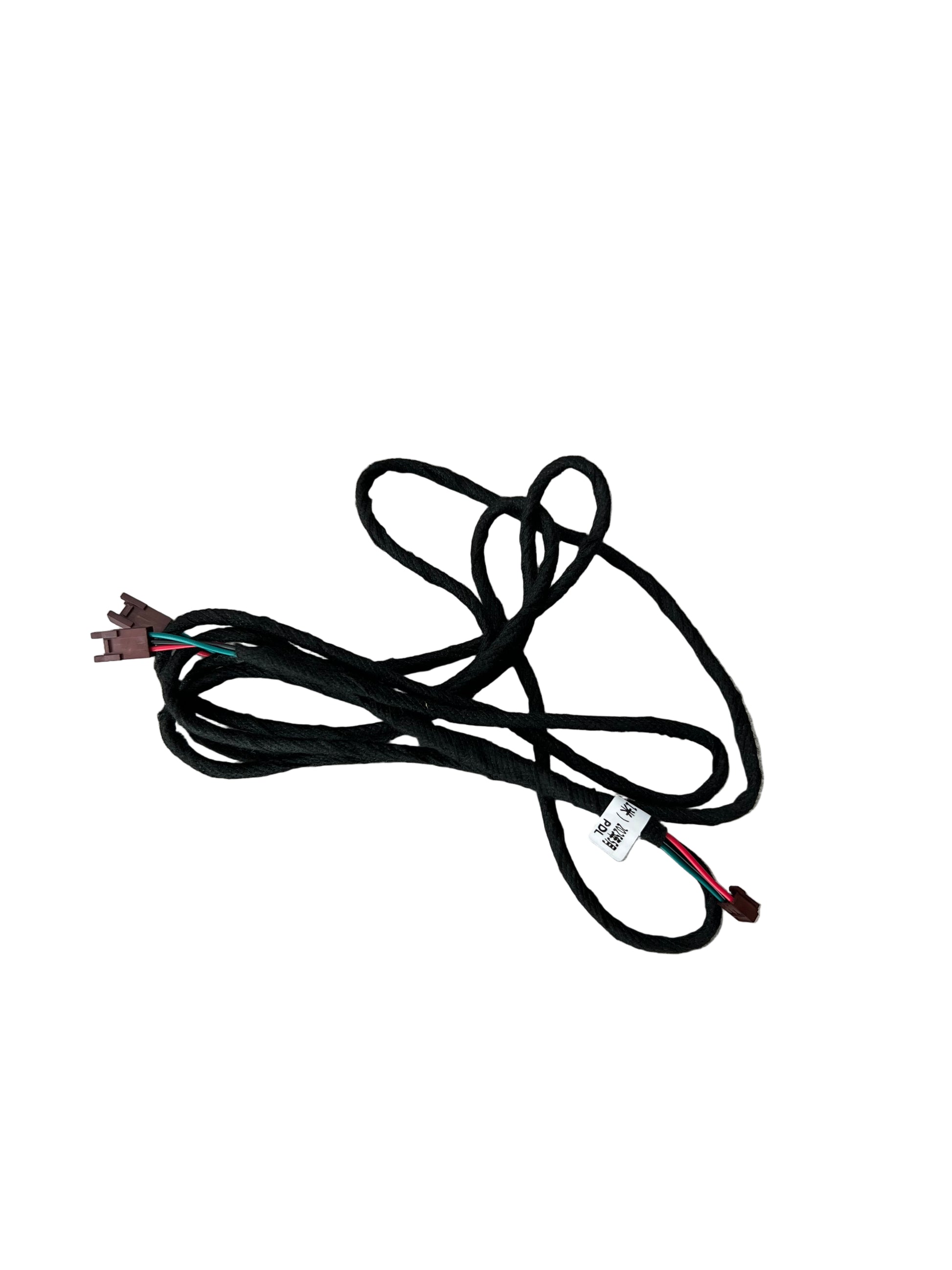 Black electrical wire harness on a wooden floor